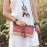 Bell button colorful pompom crossbody bag