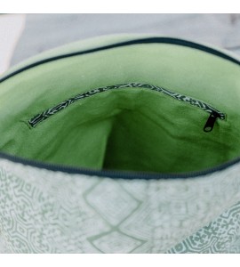 Green crossbody bag with colorful tassels