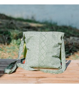 Green crossbody bag with colorful tassels