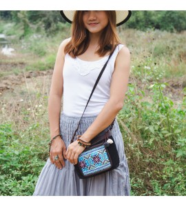 Black crossbody bag with blue pattern