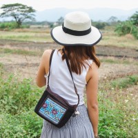 Black crossbody bag with blue pattern