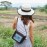 Black crossbody bag with blue pattern