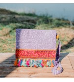 Purple vintage messenger bag with colorful tassels